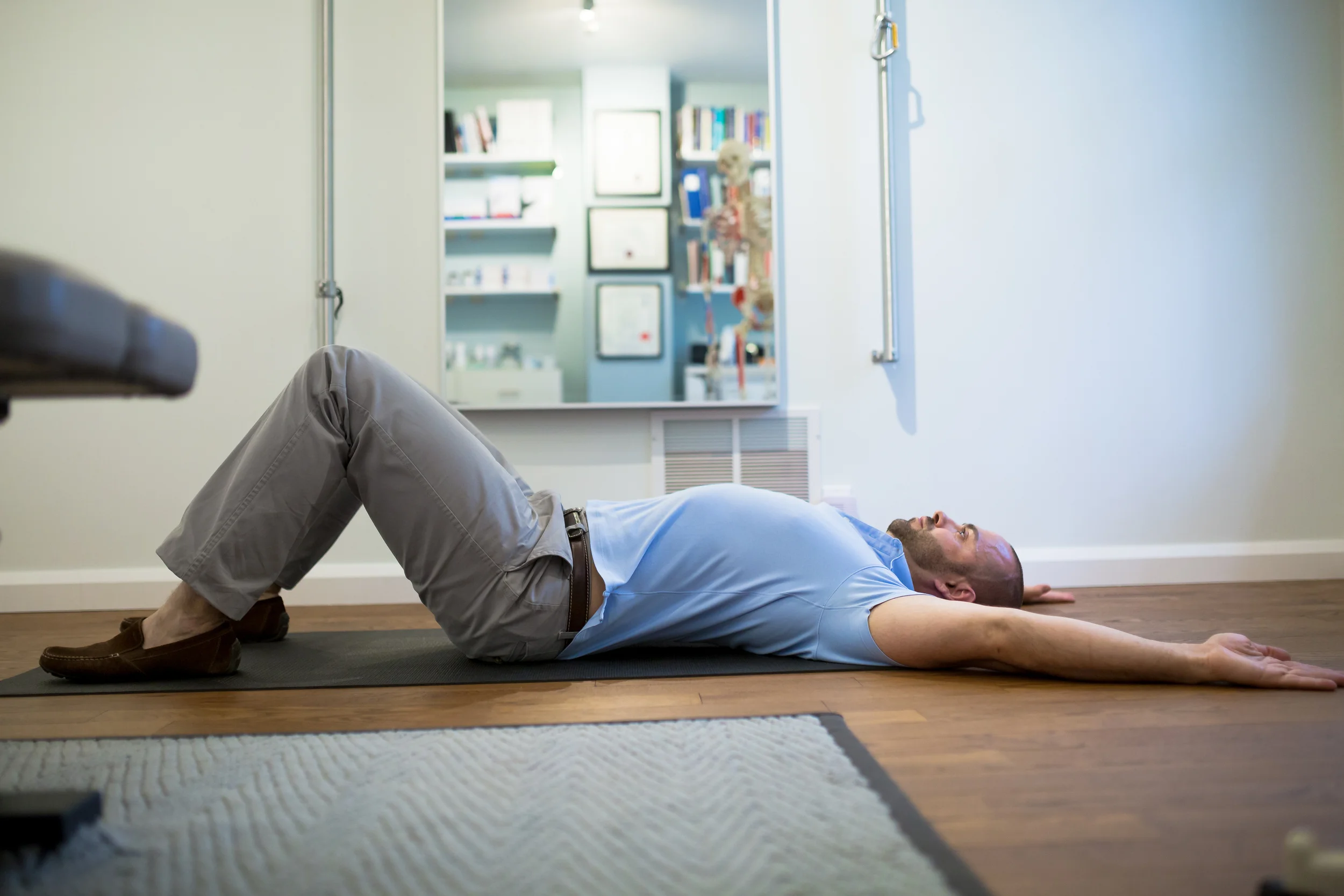 STEP 5: Keeping your spine pressed against the towel slide your arms as high as you can without your hands leaving the floor and not loosing your abdominal brace It is much tougher than it looks, but very effective.