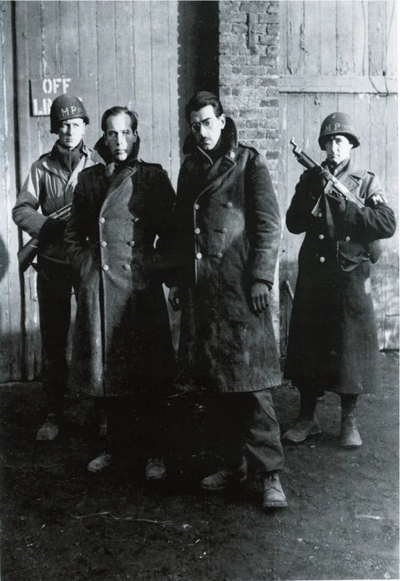 Were these two suspect fellows undercover commandos who got in over their heads like my fictional Max Kaspar? The photo's origin remains unconfirmed. They may have been deserters, but were probably captured German soldiers in American gear. (Planet News/TopFoto)
