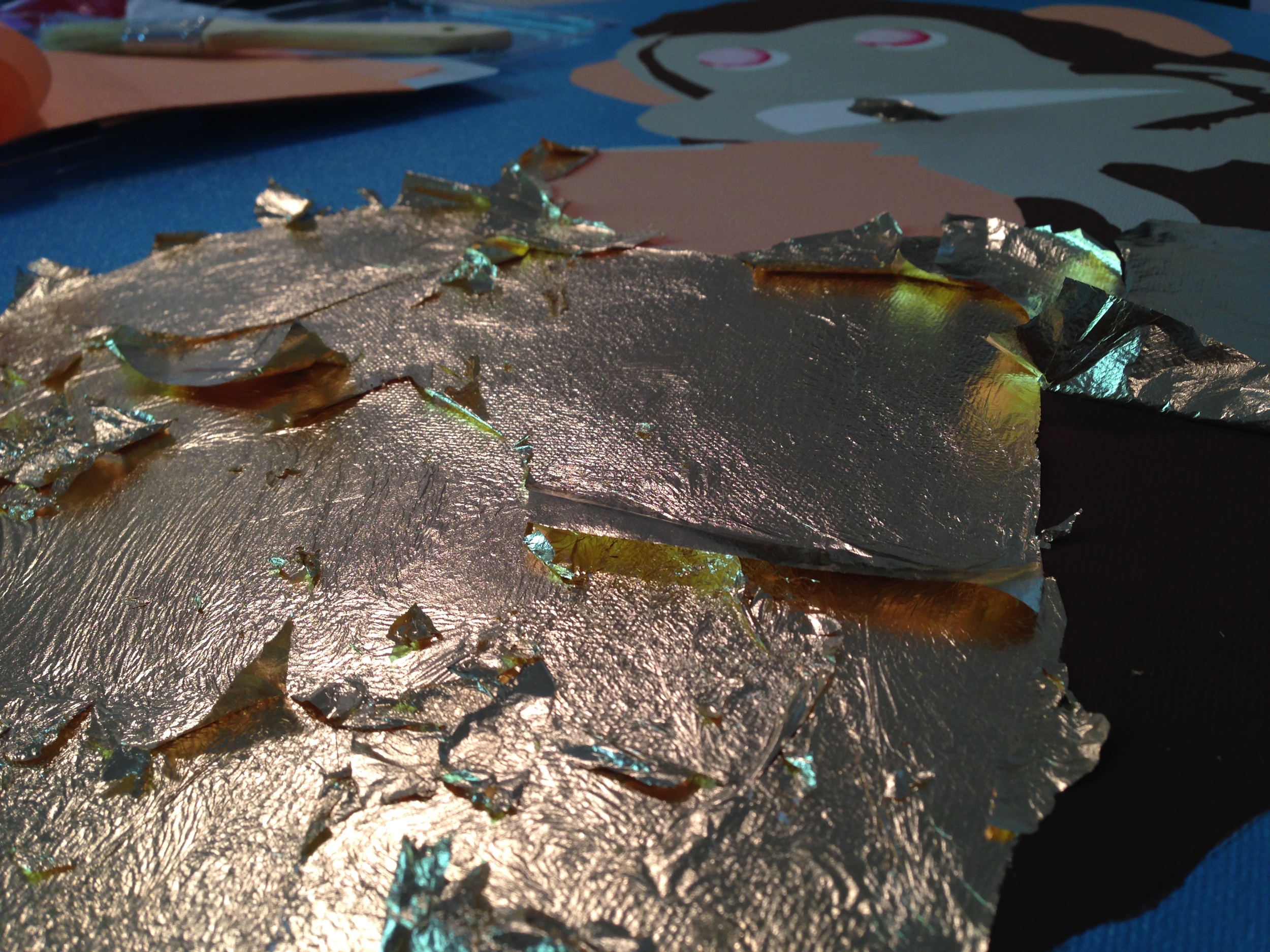 Adding some gold leaf for the cymbals.