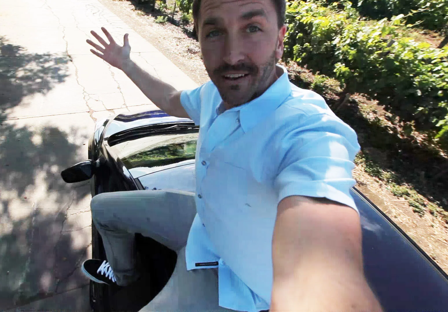 If this picture had audio, you'd hear Joe screaming, "Look! I'm on top of a car!"