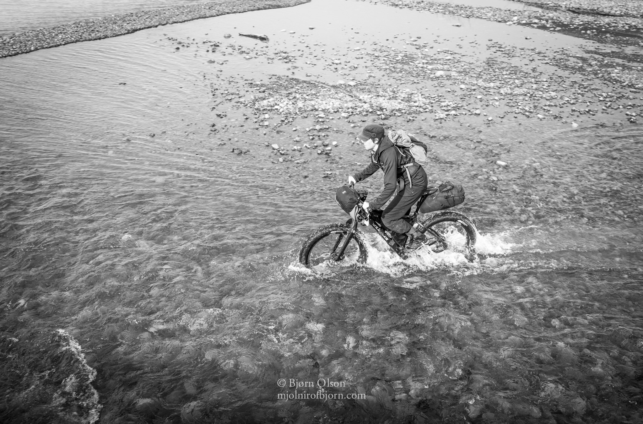 Kim crosses a shallow creek.