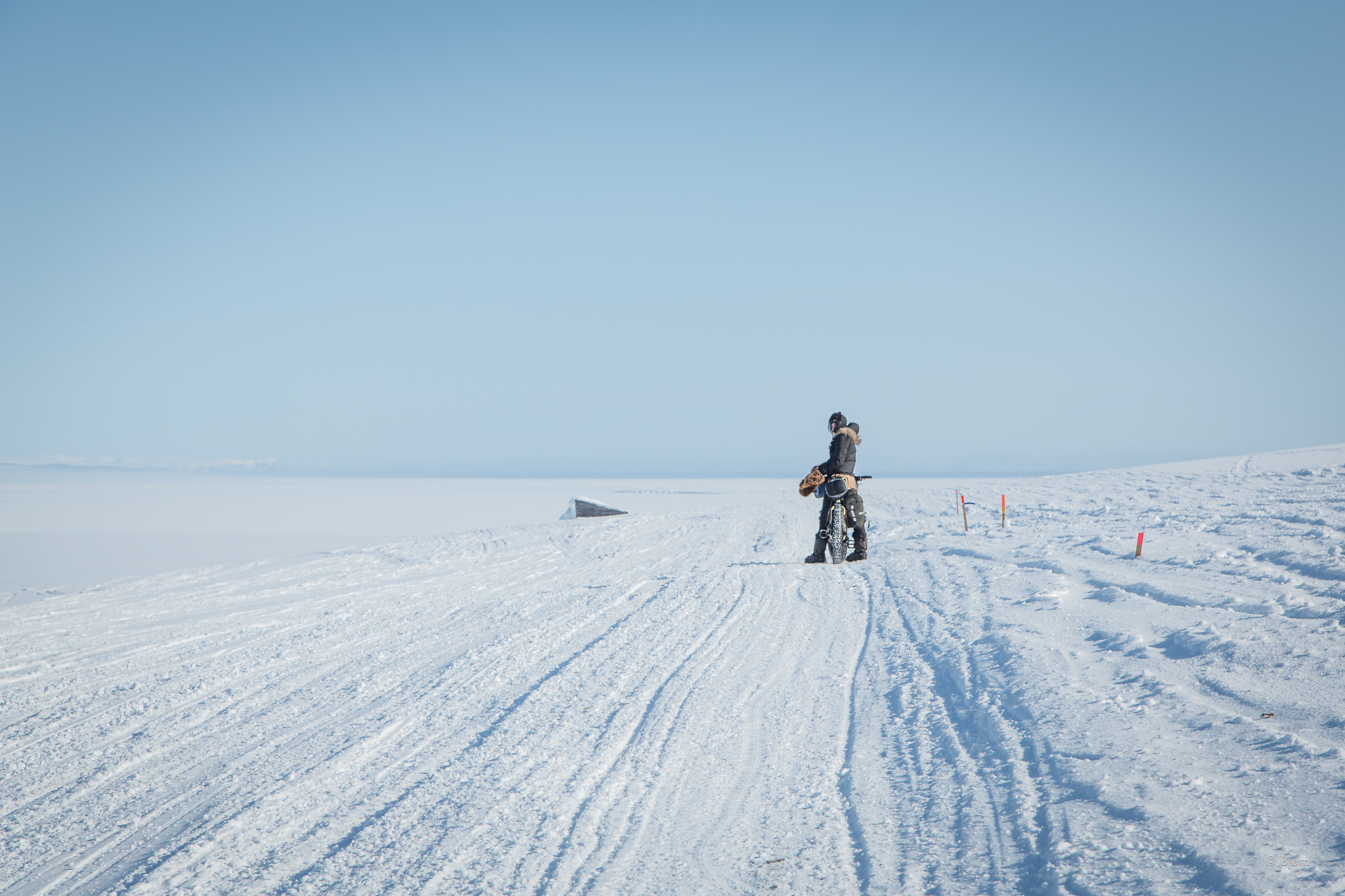 Kim atop Cape Nome. Hard to believe that a storm was in the forecast and two mushers had had to be evacuated earlier this same day not too far from here. 
