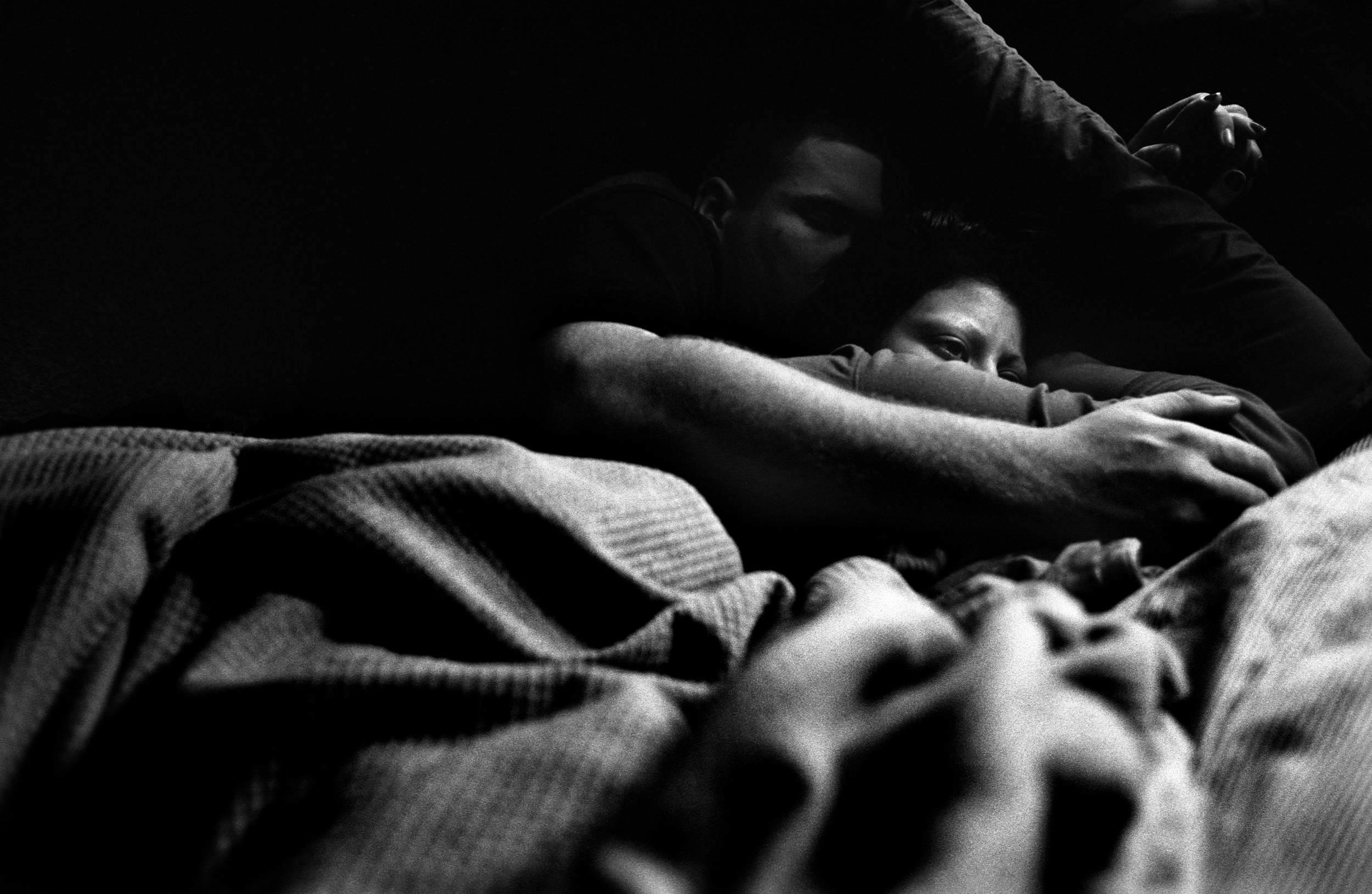  SPC Adam Ramsey lies in bed with friend, Savannah Gordon, after taking opioids at his sister's house in Carson City, Nevada,&nbsp;2010. 