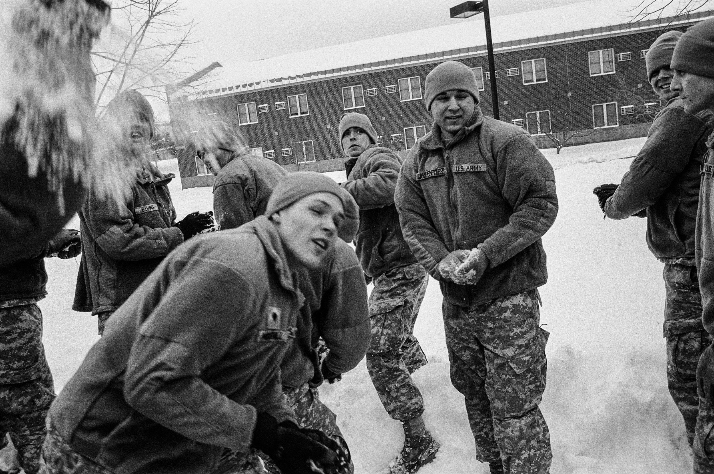  Soldiers of Bravo Company,&nbsp;1-32nd Infantry Regiment have a snowball fight after being released for the weekend at the 10th Mountain Division base, Fort Drum, New York,&nbsp;2010. 