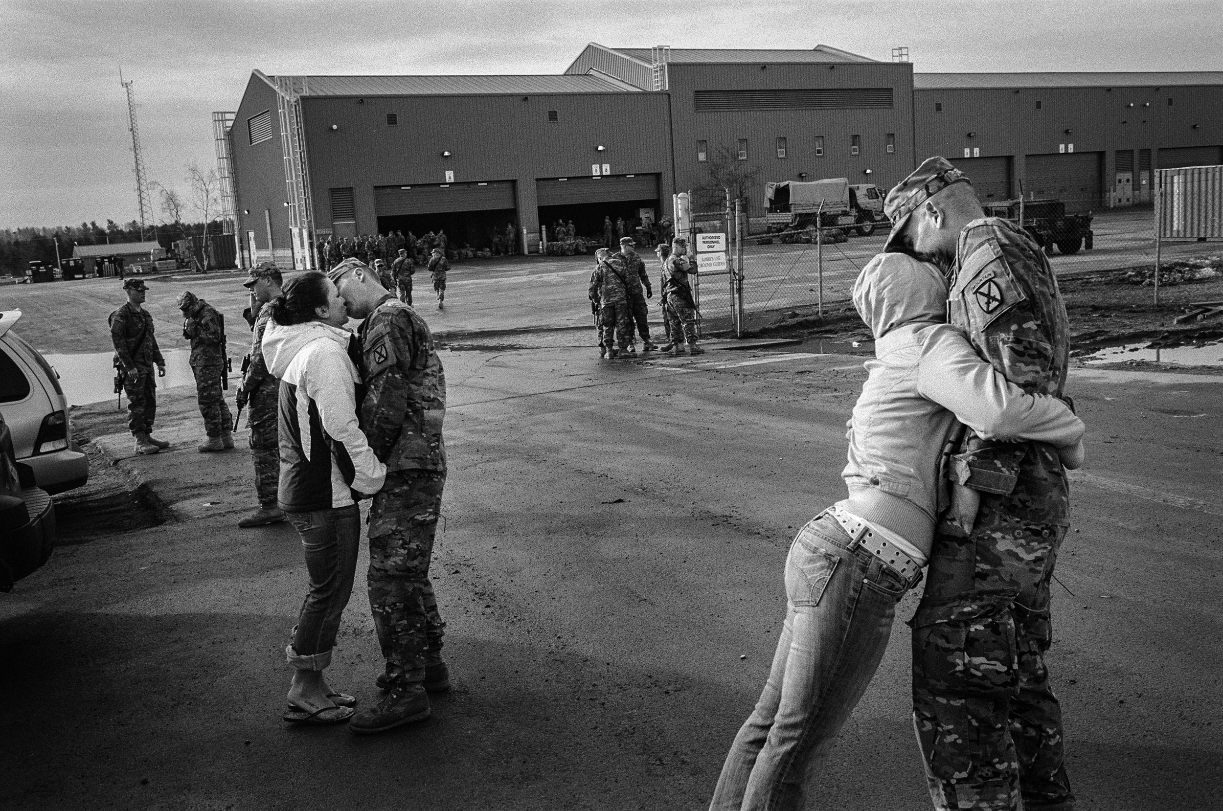  Soldiers say goodbye to their wives before deploying to Afghanistan at Fort Drum, New York,&nbsp;2011. 