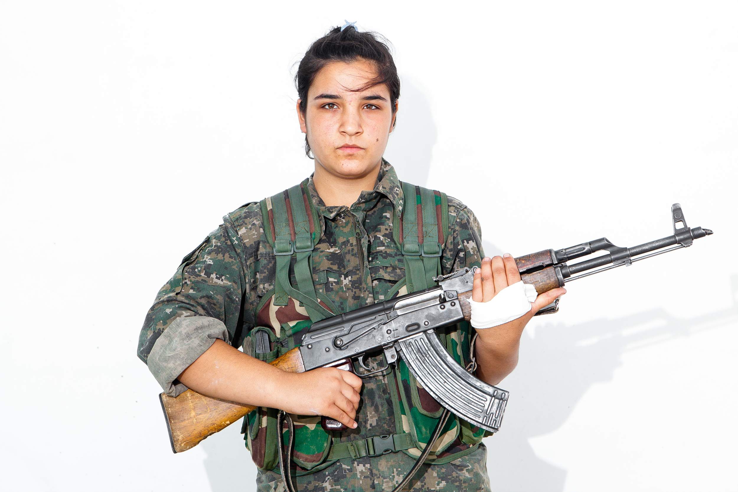  Zevin Botan, 20; photographed on the outskirts of Raabia, Iraq. 