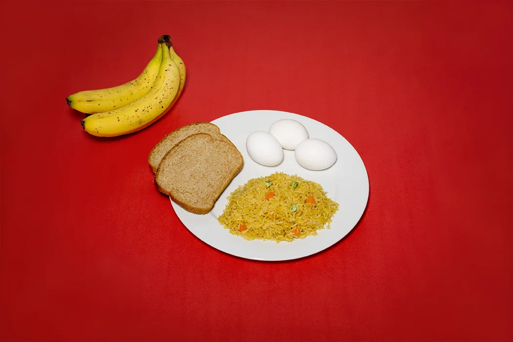 MIR AIMAL KASI November 14, 2002 Fried rice, bananas, boiled eggs and wheat bread.