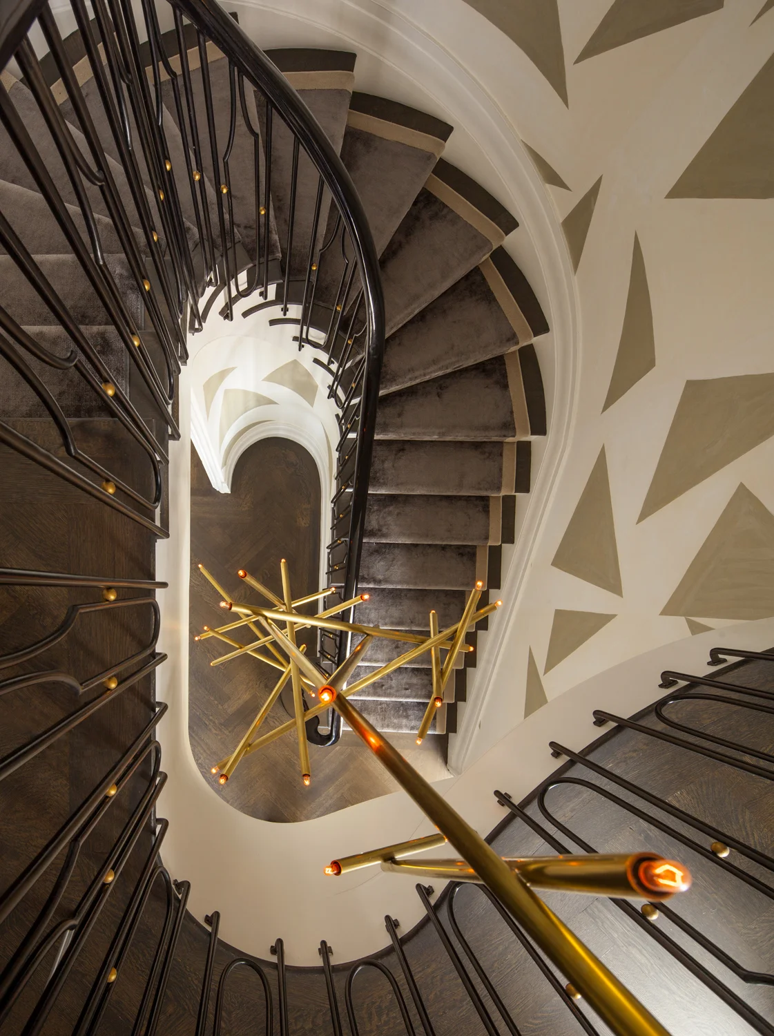 Brass Light Fixture Over Staircase