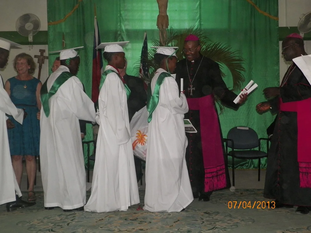 handsing out diplomas.jpg
