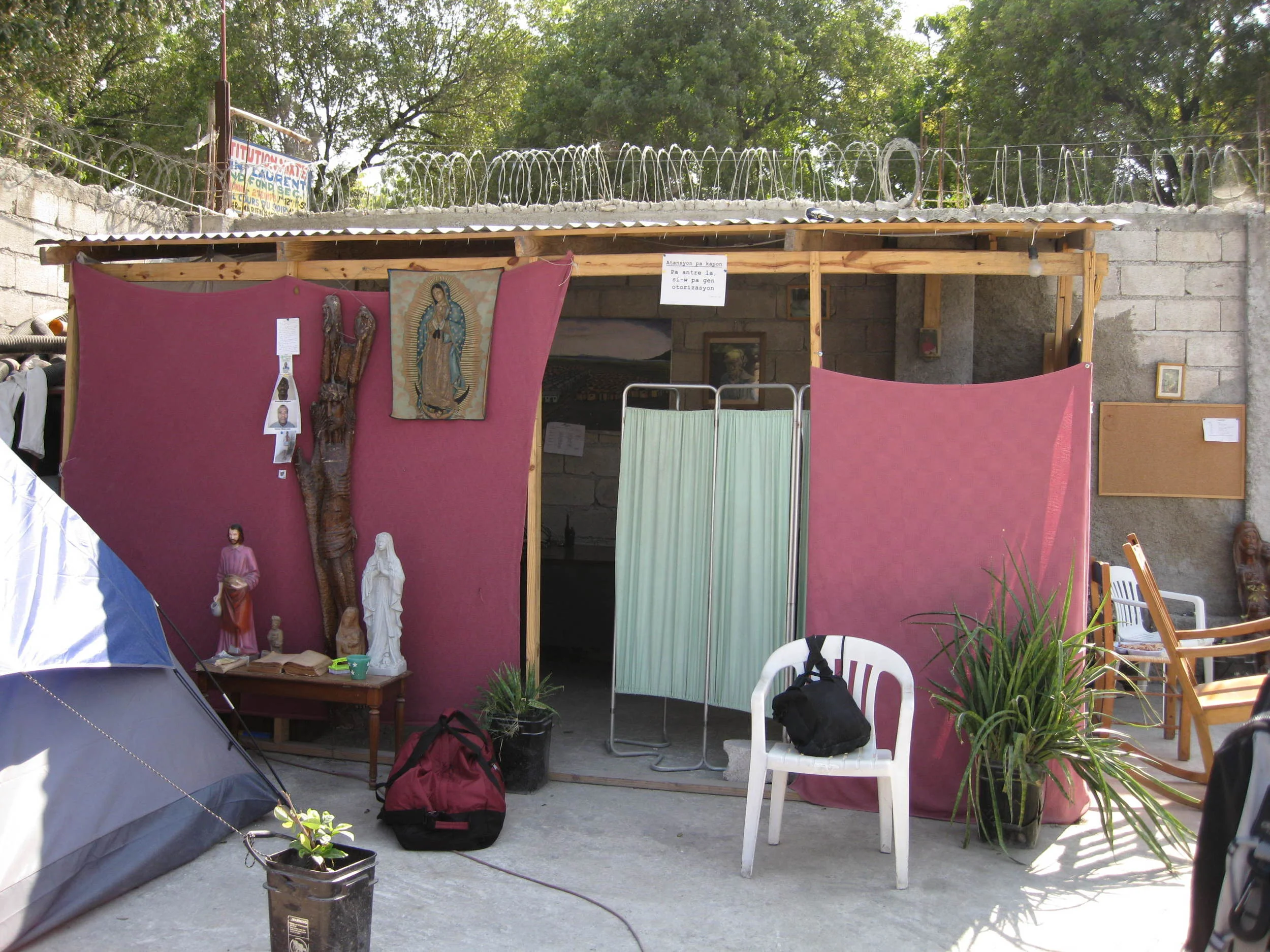  Fr. Tom created a makeshift chapel after the destruction. 
