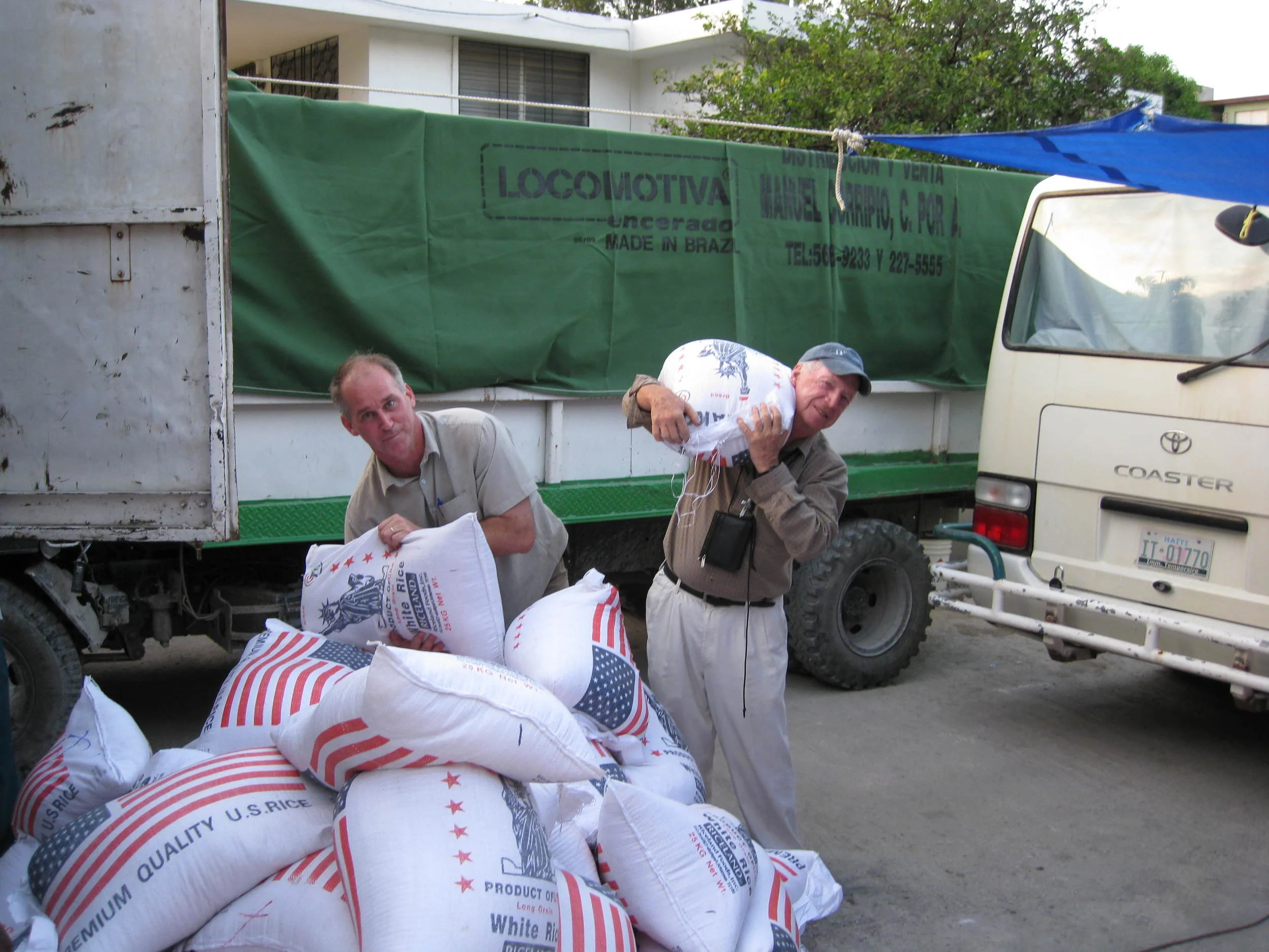  Doug Campbell and Fr. Tom assist in the relief effort&nbsp;   
