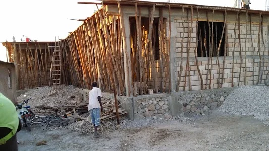 Construction of HT's new nutrition center and primary school in the Ti Kouleve slum of Gonaives.