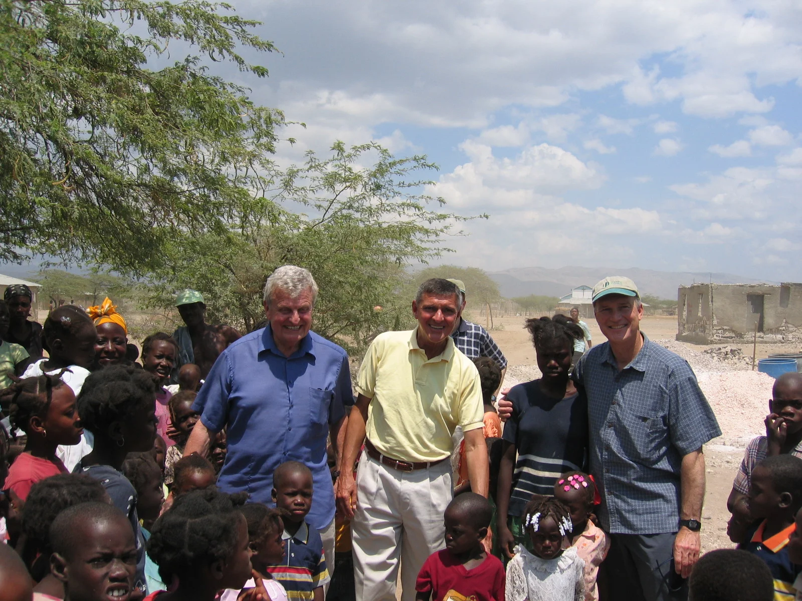 l to r: Paul Sigmund with fellow HT trustees, Tom Gilligan and John Clarke visiting our school in Ti Desdunnes Haiti.