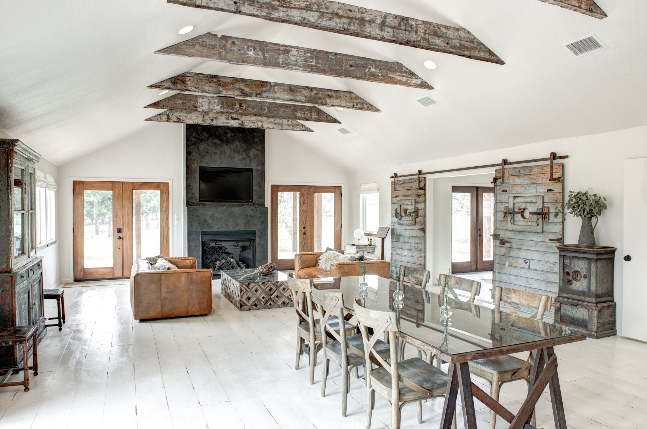   The 900-sq-ft Boho great room includes a gas fireplace and dining table for 8.  