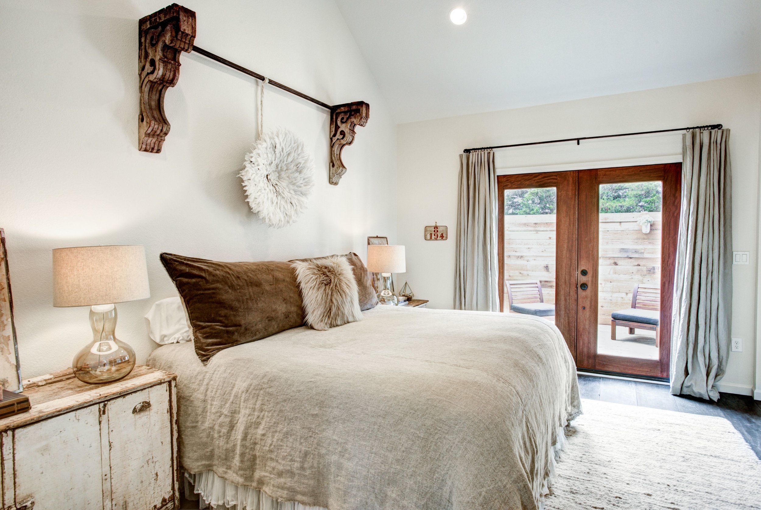   The Boho master bedroom features a king-sized bed, ensuite full bath with soaking tub and separate shower, and a private ensuite patio.  