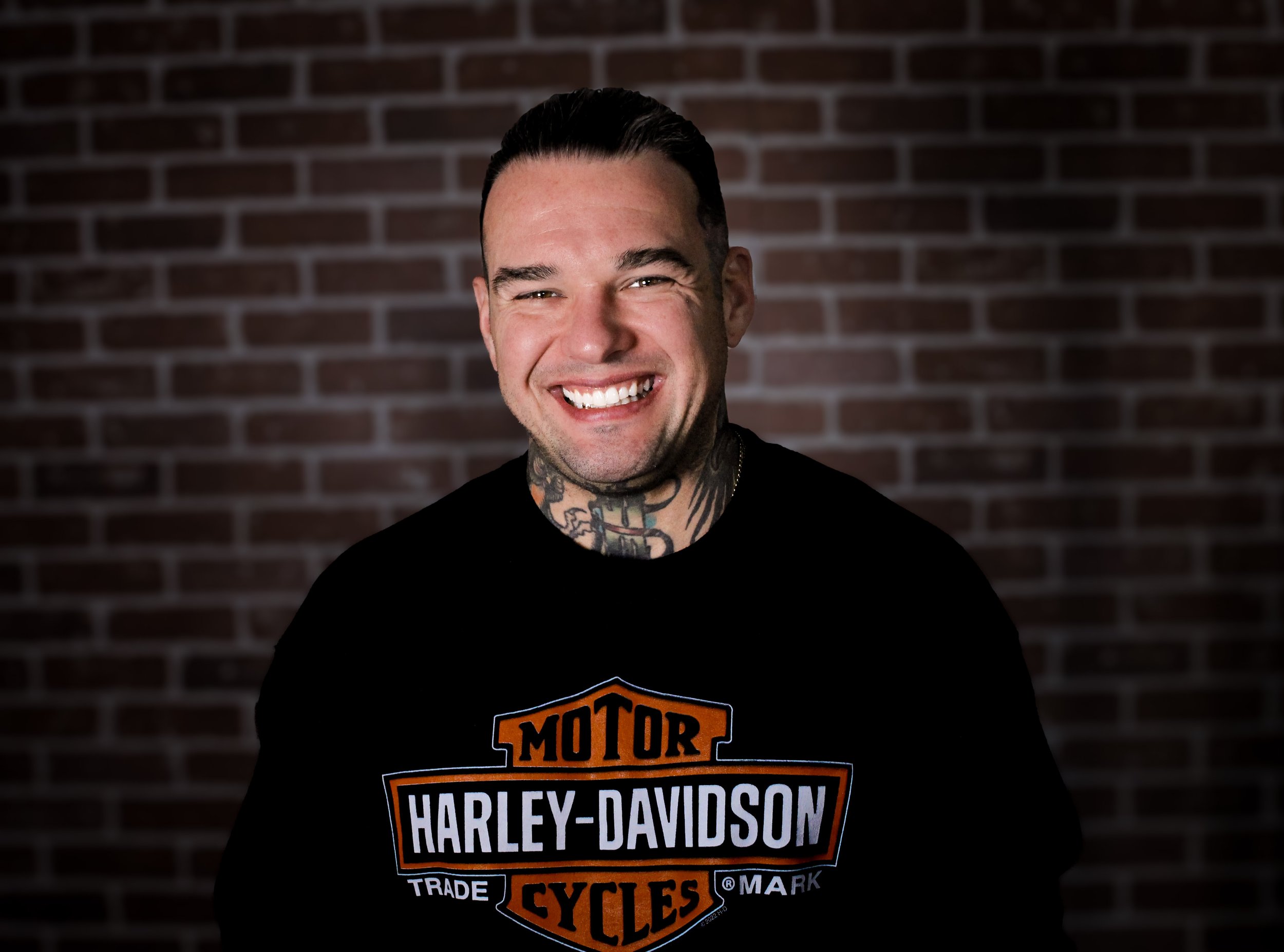 Shan Claydon - Alberta's Best Professional Lettering Tattoo Artist at Fountainhead Tattoo in South Edmonton