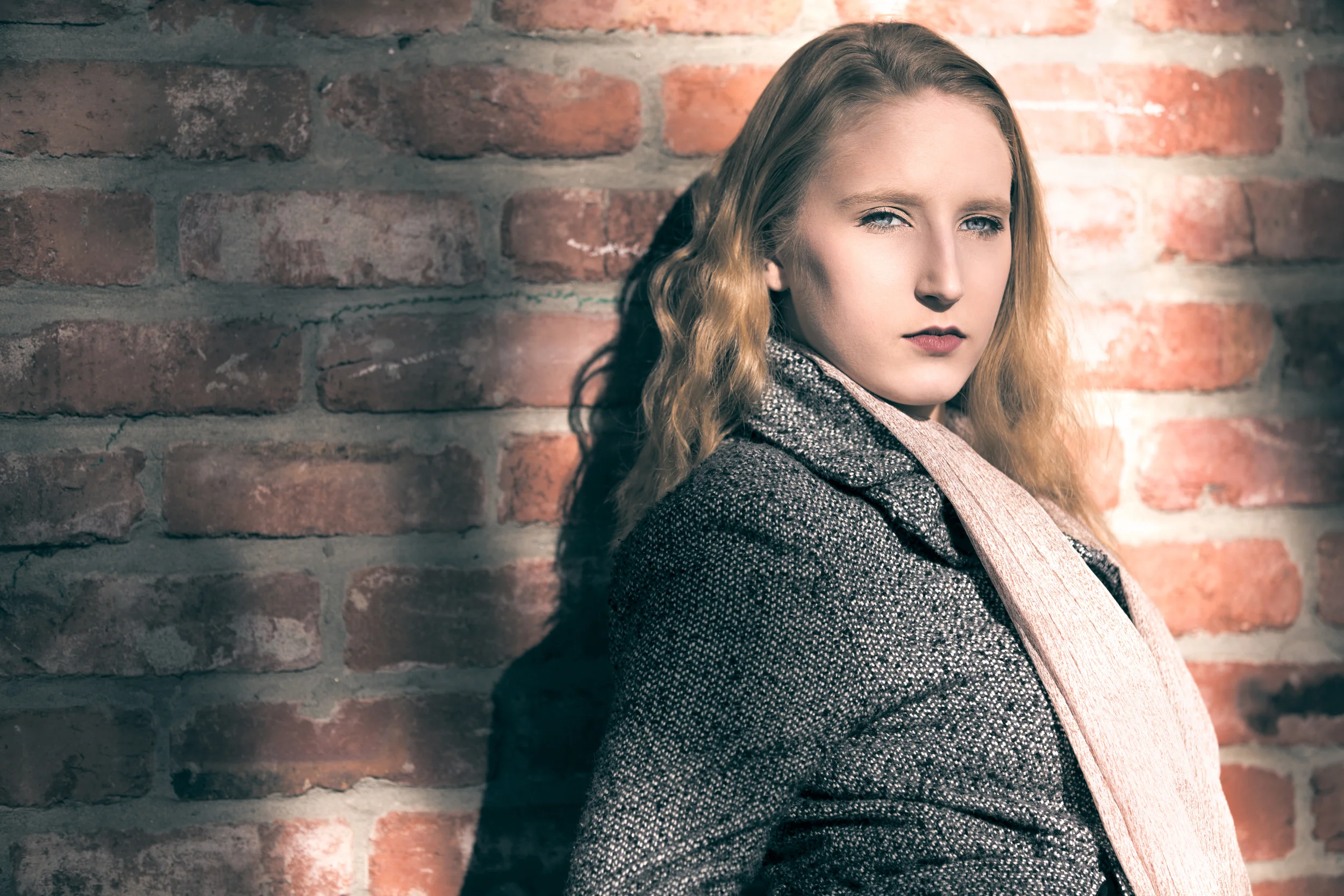 Natural light portrait using a pocket of light from a tree