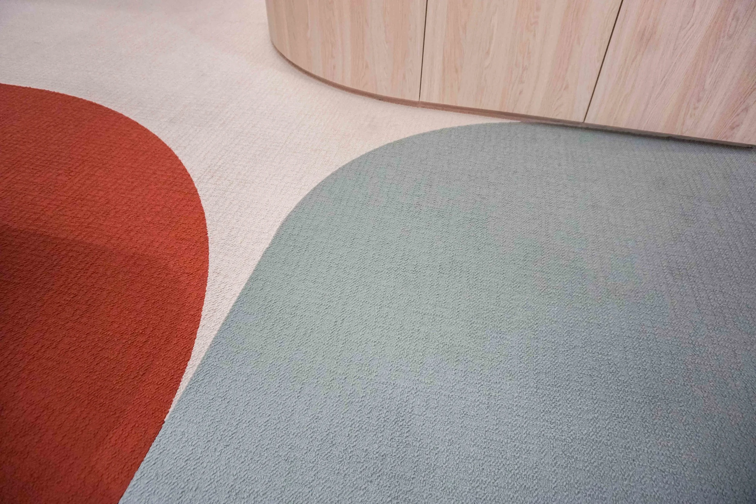 The colours are composed of various hues of blues, green, oranges, and reds, but muted to ensure the working environment is calm and comfortable. 