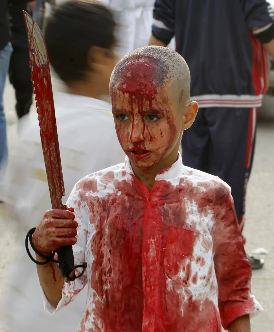 iraqi-shiite-muslim-child-gashes-his-forehead-sword.jpg
