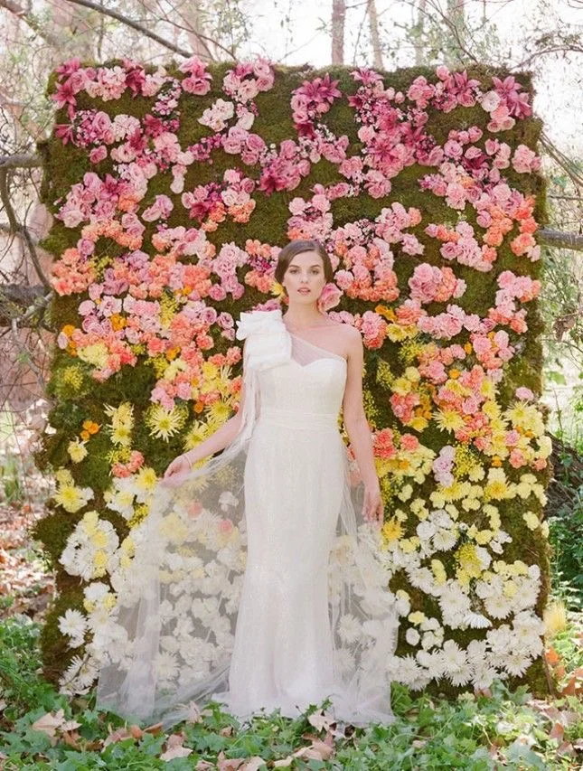 Flower crowns, backdrops, table runners, Oh my! A look into this year's floral trends in weddings