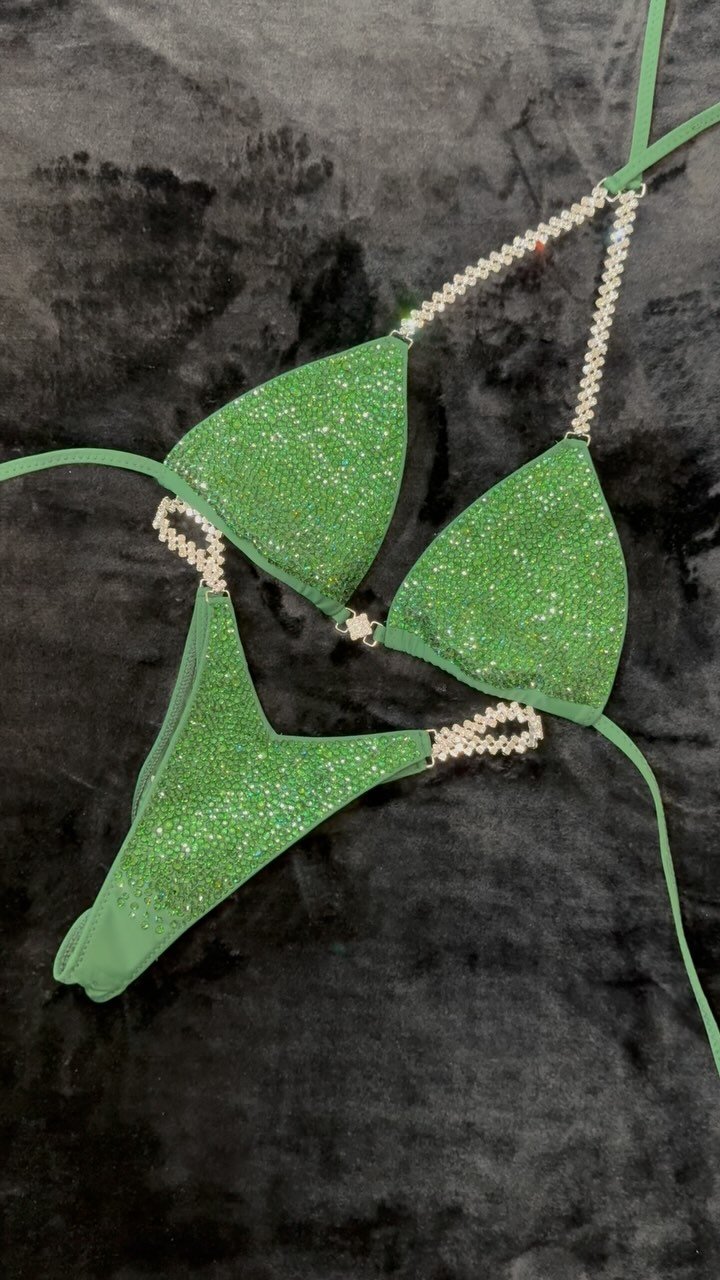 She is always the hunter, never the prey
💚
Let&rsquo;s welcome survivor the latest Competition suit rental here at @collections_by_collins_ she is ready for her next victim on stage!
💚
this amazing Suit has a hunter green matte base and is encruste