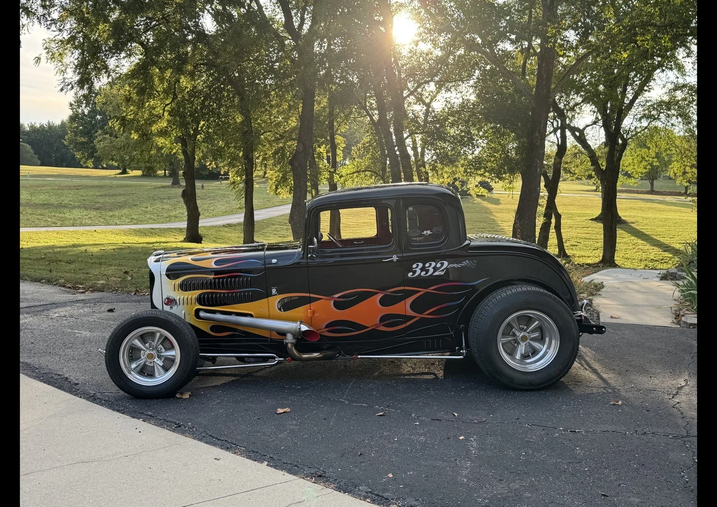 Black 1932 Ford 5 Window Coupe hot rod with orange and yellow flames, the first car announced for Bobby's Picks, brought by Jason Slover of Pete and Jake's Hot Rod Parts.