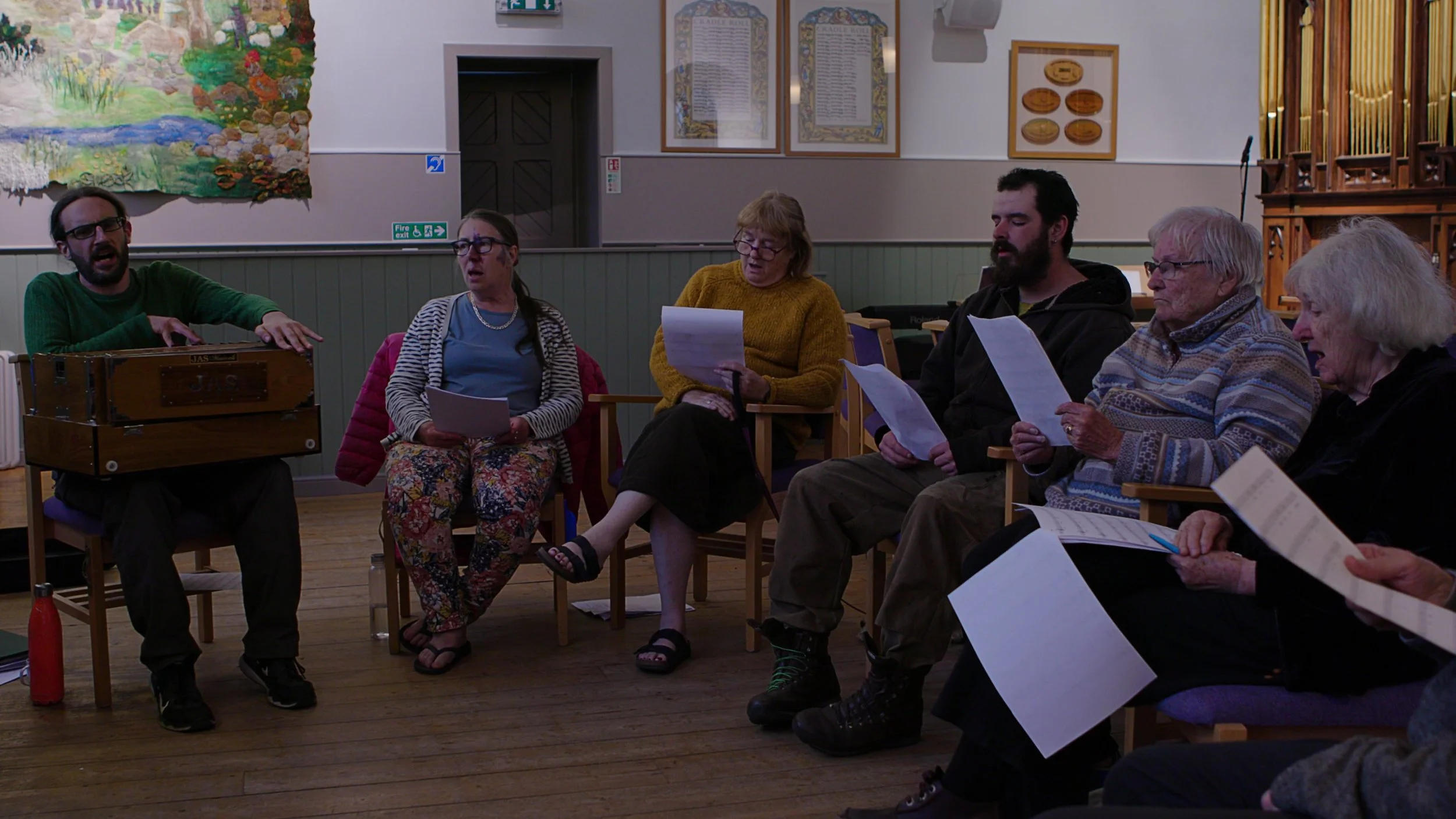 wide shot of a gaelic psalms group singing