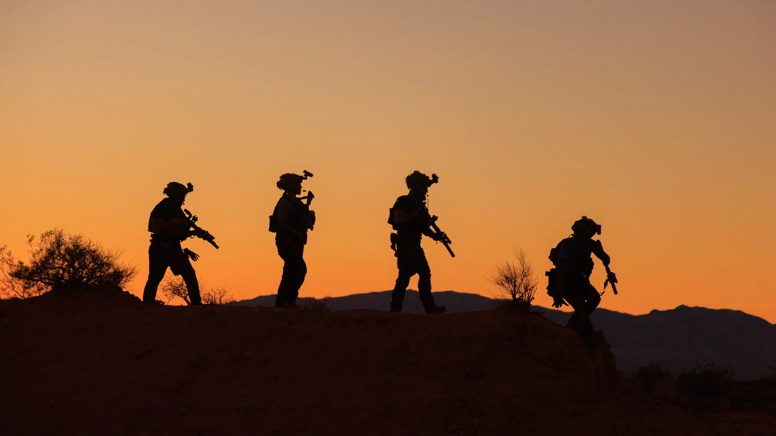 soldiers walk across sunset-Mil-LEO-LM_19038.jpg