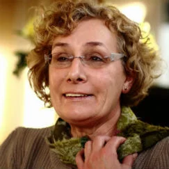 Elena smiling sideways cropped.jpg