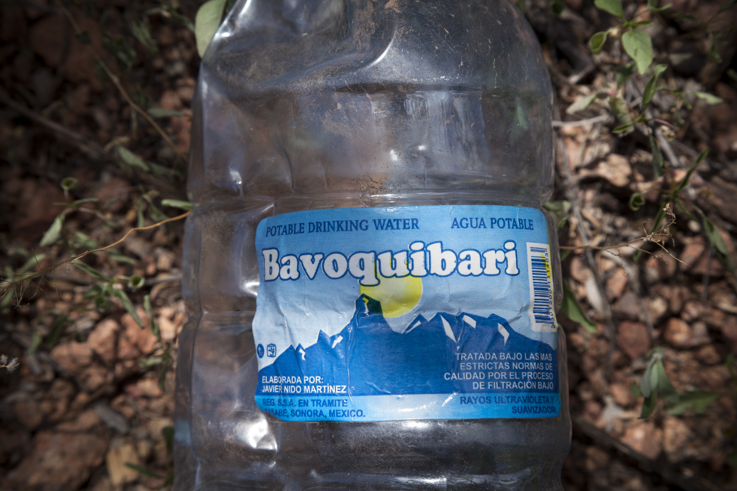  Bavoquibari Bottle, 2012 -&nbsp;Water bottle depicting Bavoquibari Mountains, which migrants use to navigate. 