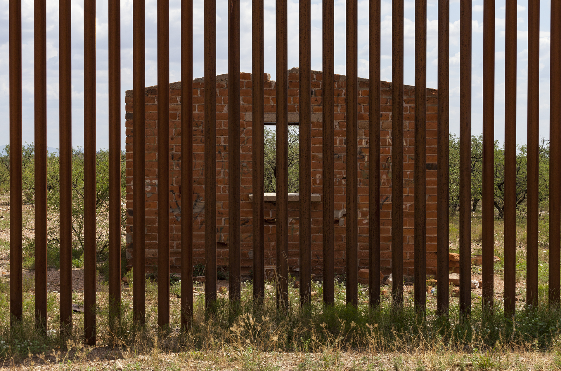  Looking into Mexico Through the Border Fence, 2012 