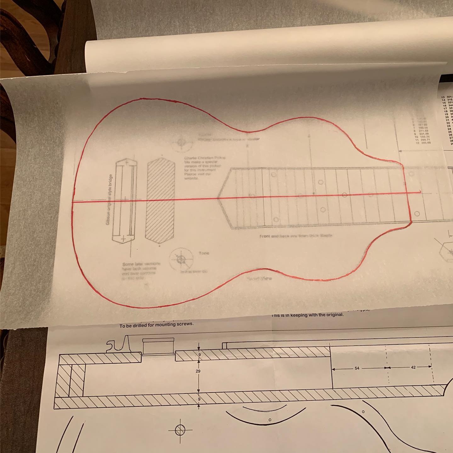The first step is to trace the design onto some tracing paper. I use a transparent velum with red sharpie as its easy to see, and the marker doesn’t bleed through. You want to be as accurate as possible, so you have to take your time.