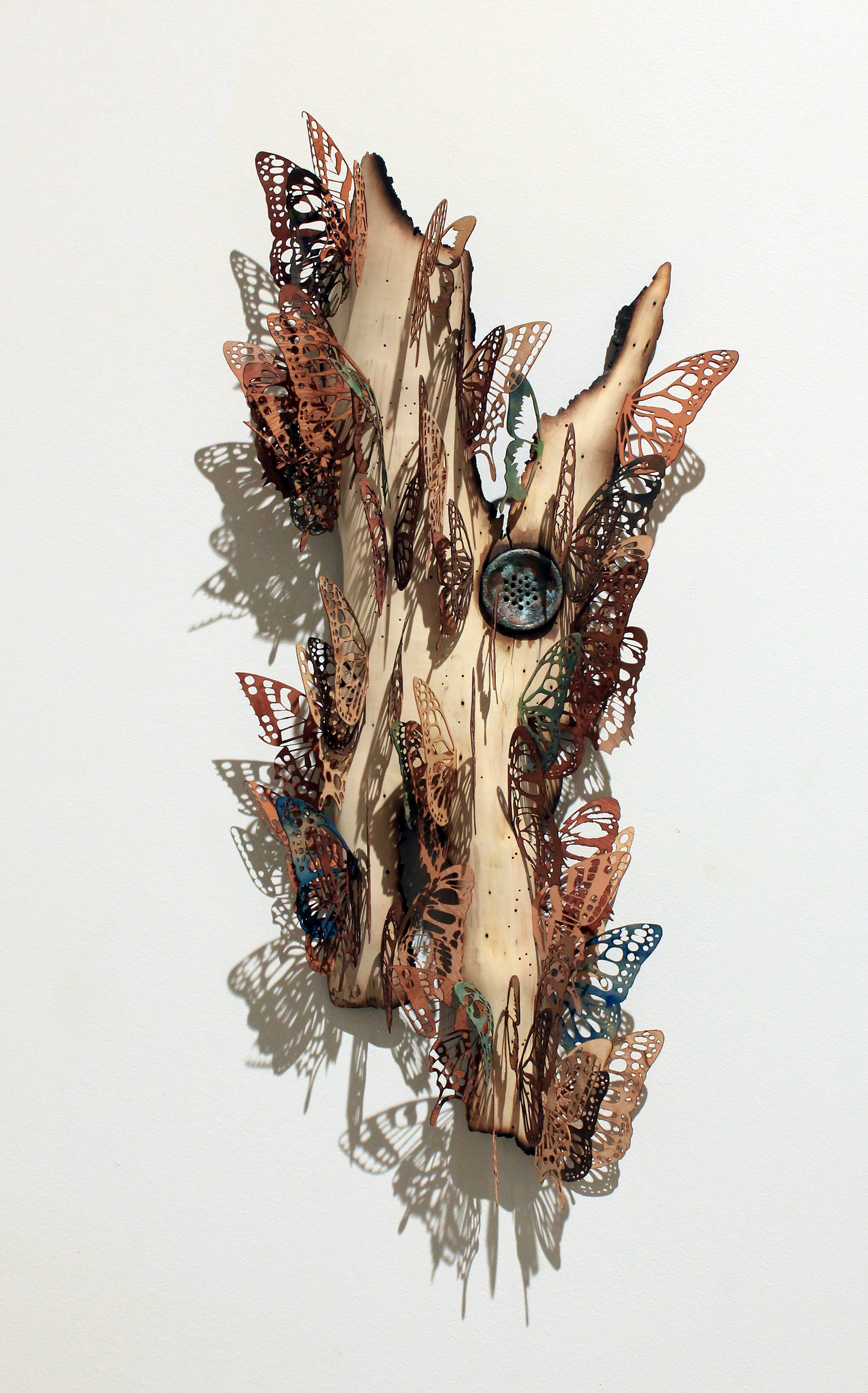 Drainage, 2014. 22" x 10" x 4". wood veneer, maple.