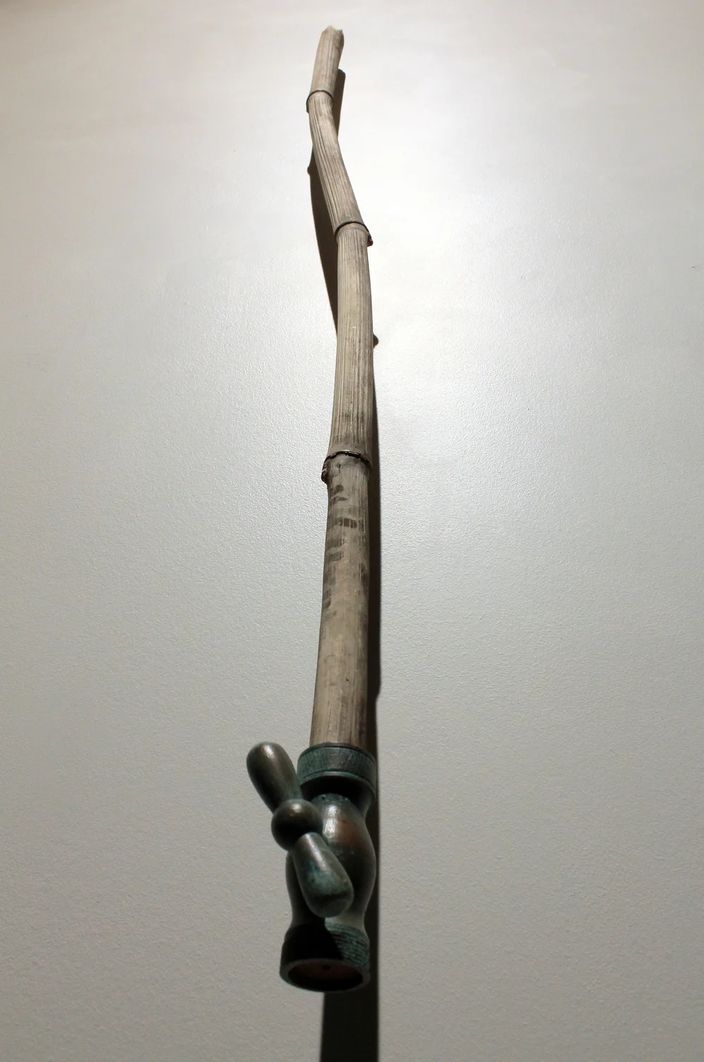 Sustain, 2014. 48" x 3" x 4". yellow heart, bamboo shoot. SOLD