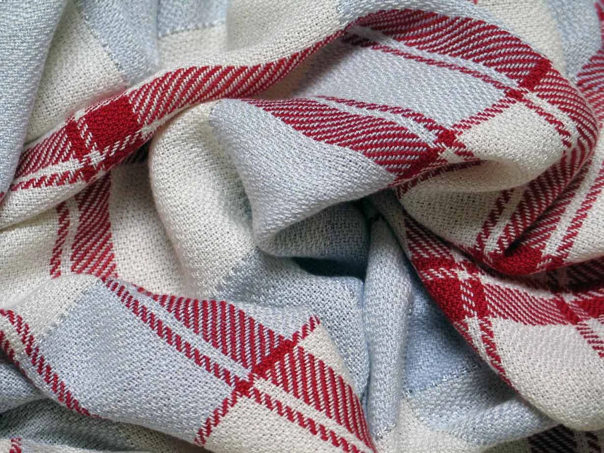 Handwoven tencel scarf by Marty Pomeroy. Used on all Contact pages.