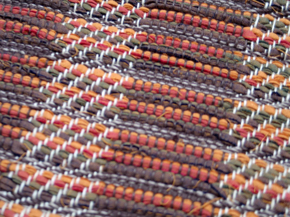 Autumn rag rug by Vivian Downing. Used on Calendar page.