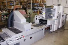 PRIME UV's UV Conveyor System curing UV in-line with a Hamada Sheetfed Press.