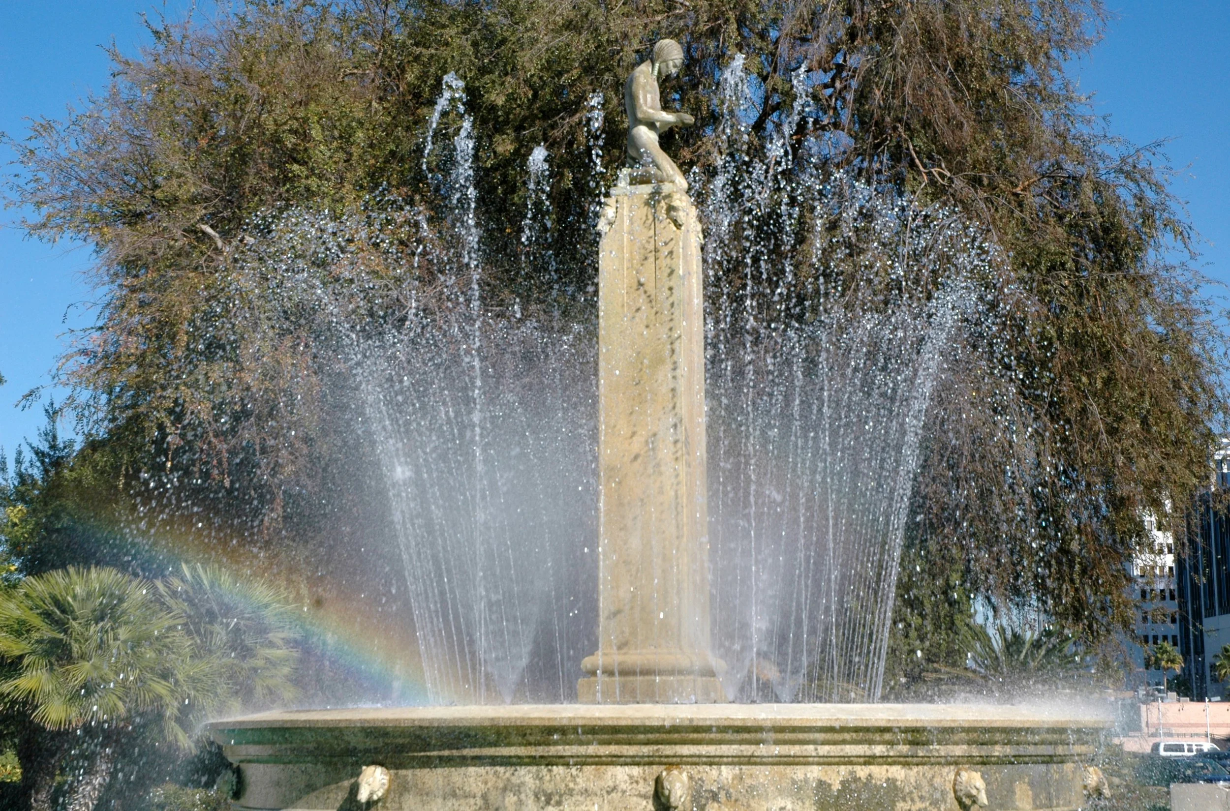 Electric fountain image of Tongva man praying