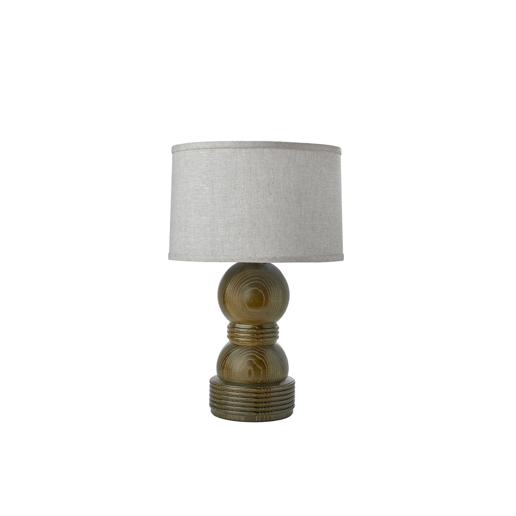 The Cassia Lamp is a made-to-order solid hardwood table lamp from O&G Studio, available in ash stain finishes, natural cherry, and natural walnut with a linen shade.