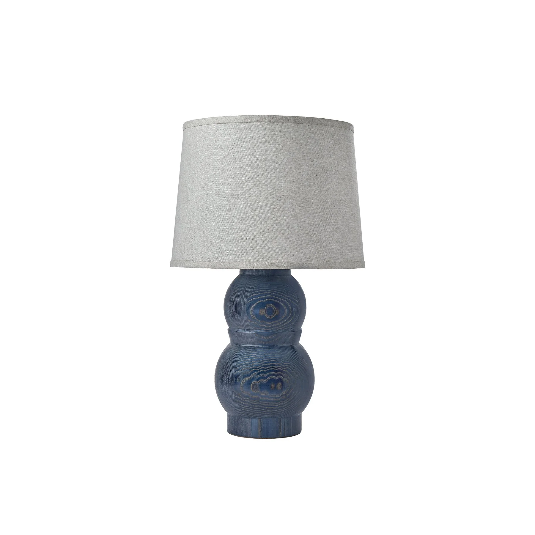 The Marion Lamp is a made-to-order solid hardwood table lamp from O&G Studio, available in ash stain finishes, natural cherry, and natural walnut with a linen shade.