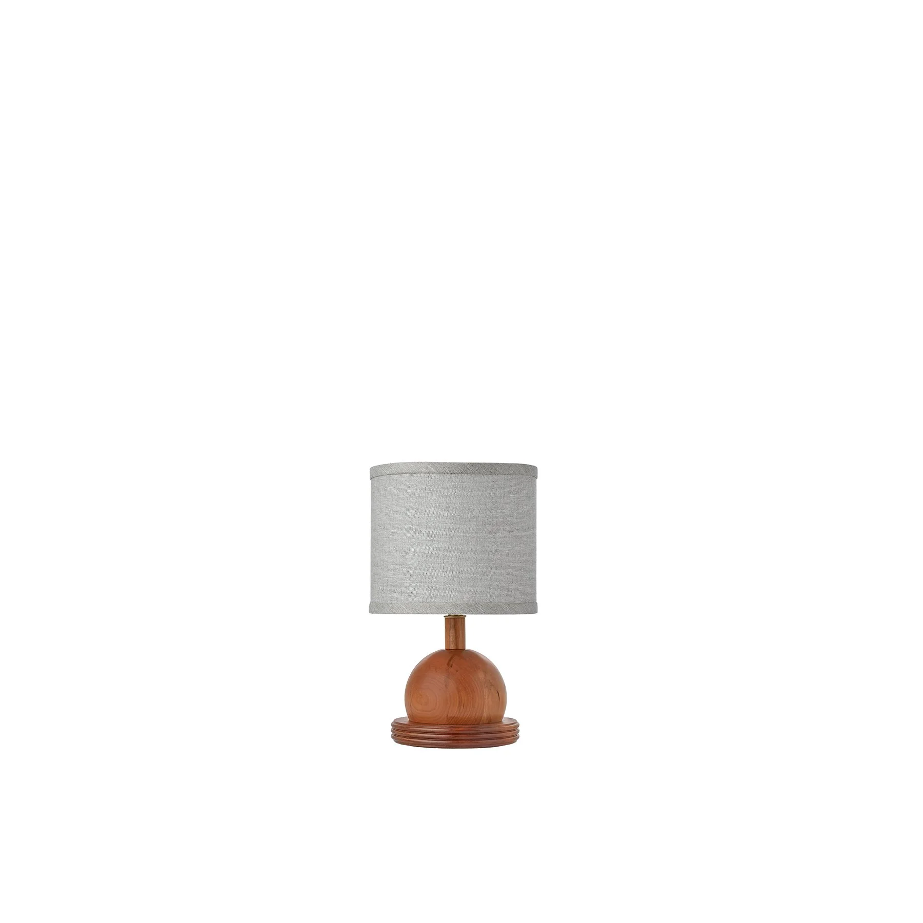 The Iris Lamp is a made-to-order solid hardwood accent lamp from O&G Studio, available in ash stain finishes, natural cherry, and natural walnut with a linen shade.