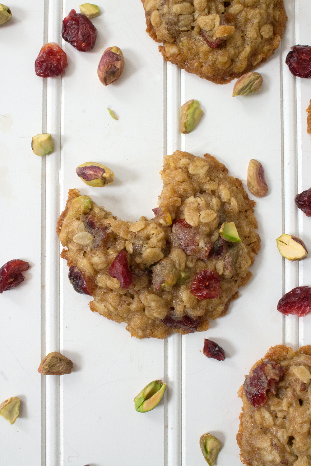 Grab the recipe for these Oatmeal Cookies packed with pistachios and cranberries. Recipe from UnusuallyLovely.com