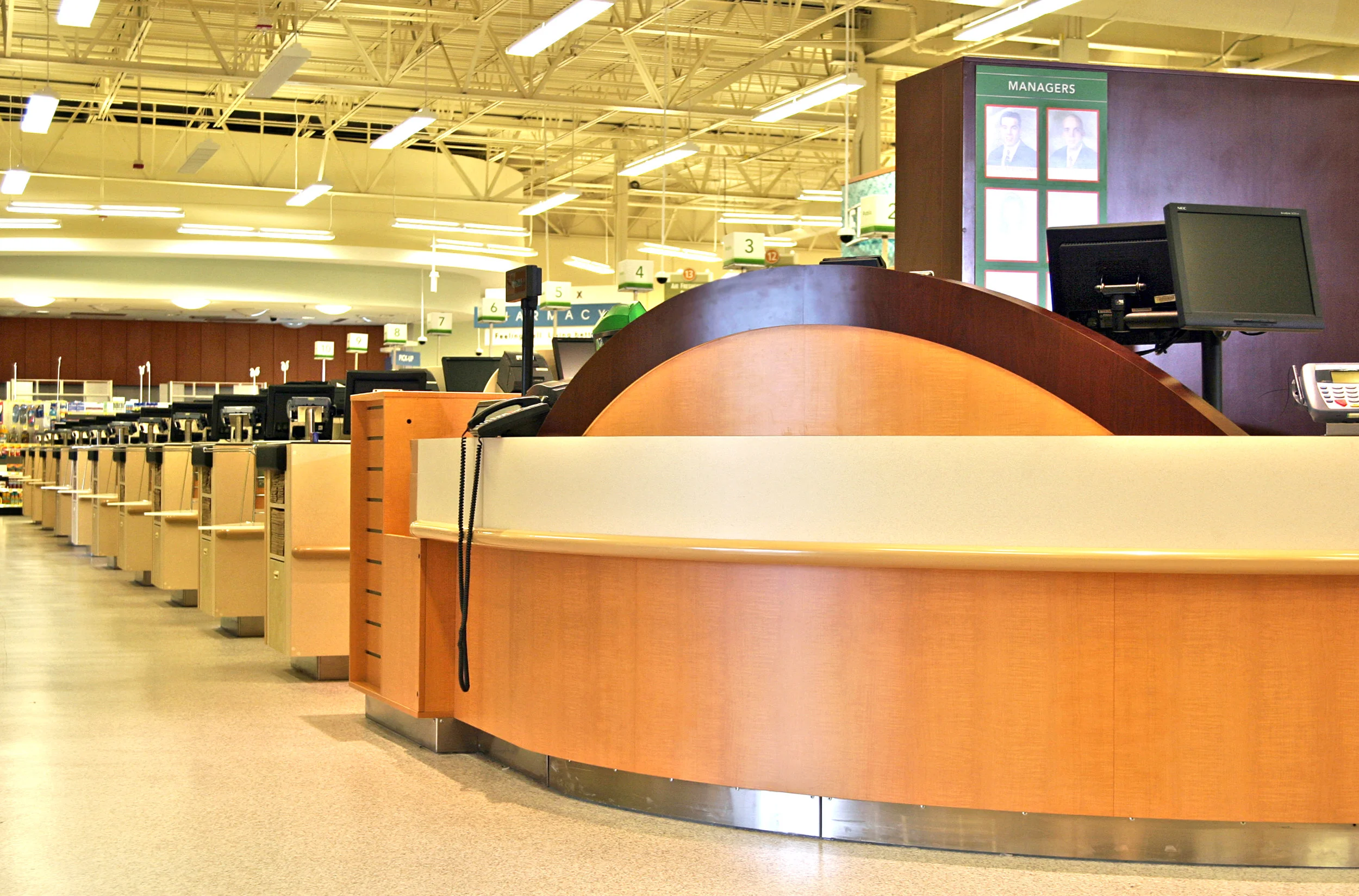 Bumpers on a customer service counter and checkstands.