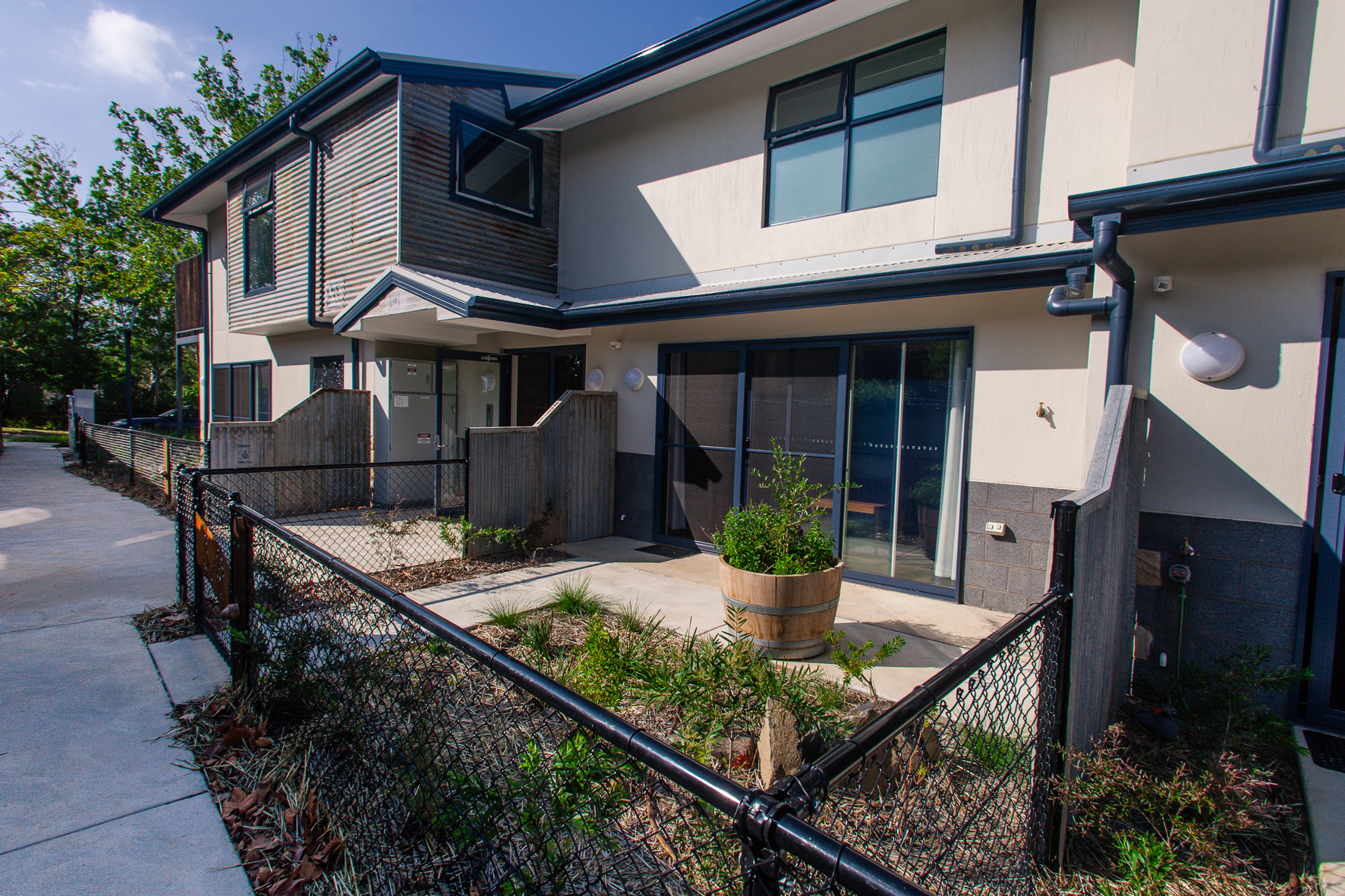 Re-purposed corrugated iron is a prominent feature of the building's exterior. 