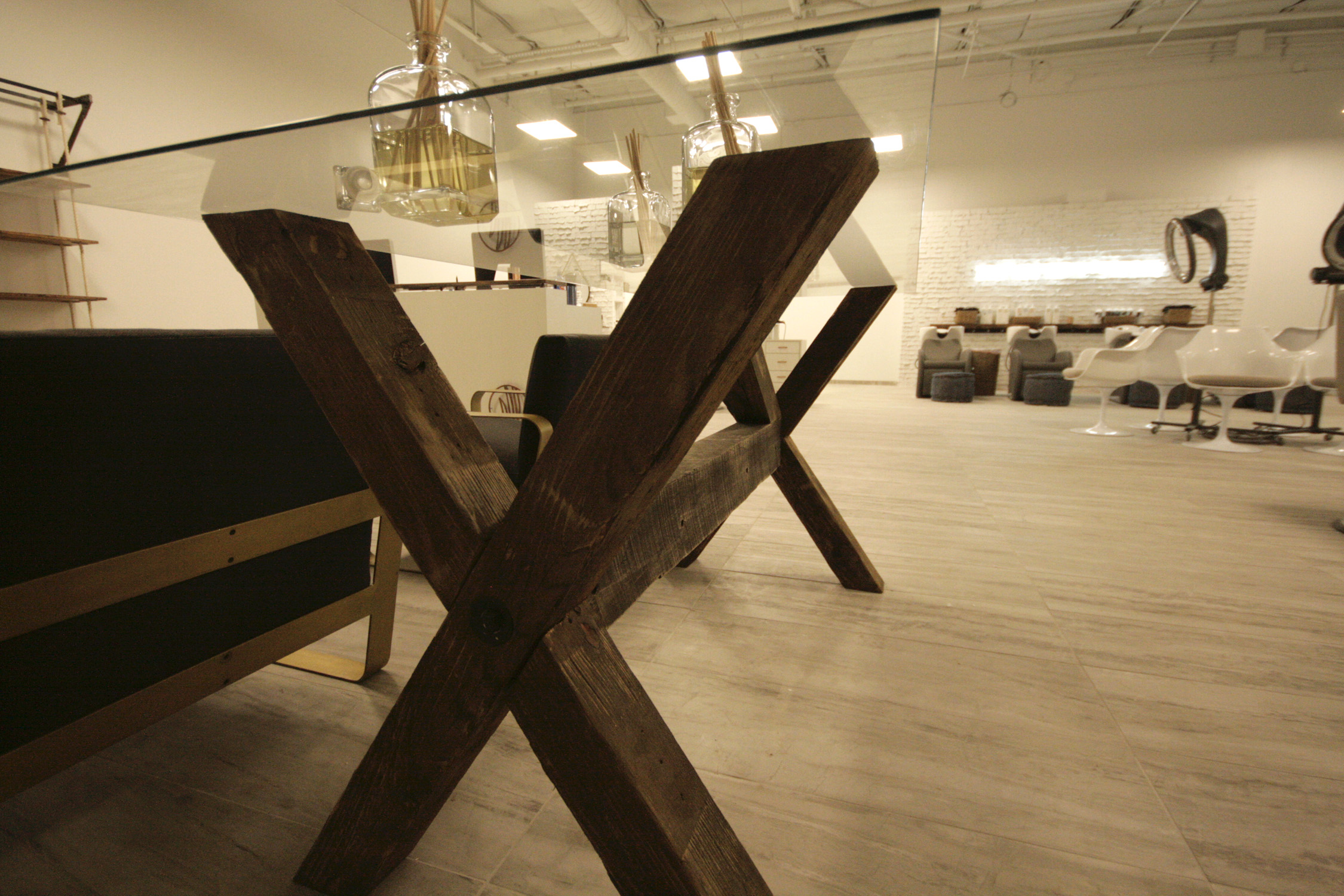 X-BASE & GLASS DISPLAY TABLE - CHARLIE & CO. - FORT WORTH, TX - 2017 Charlie + Co. is an upscale hair salon with locations in Dallas & Fort Worth.