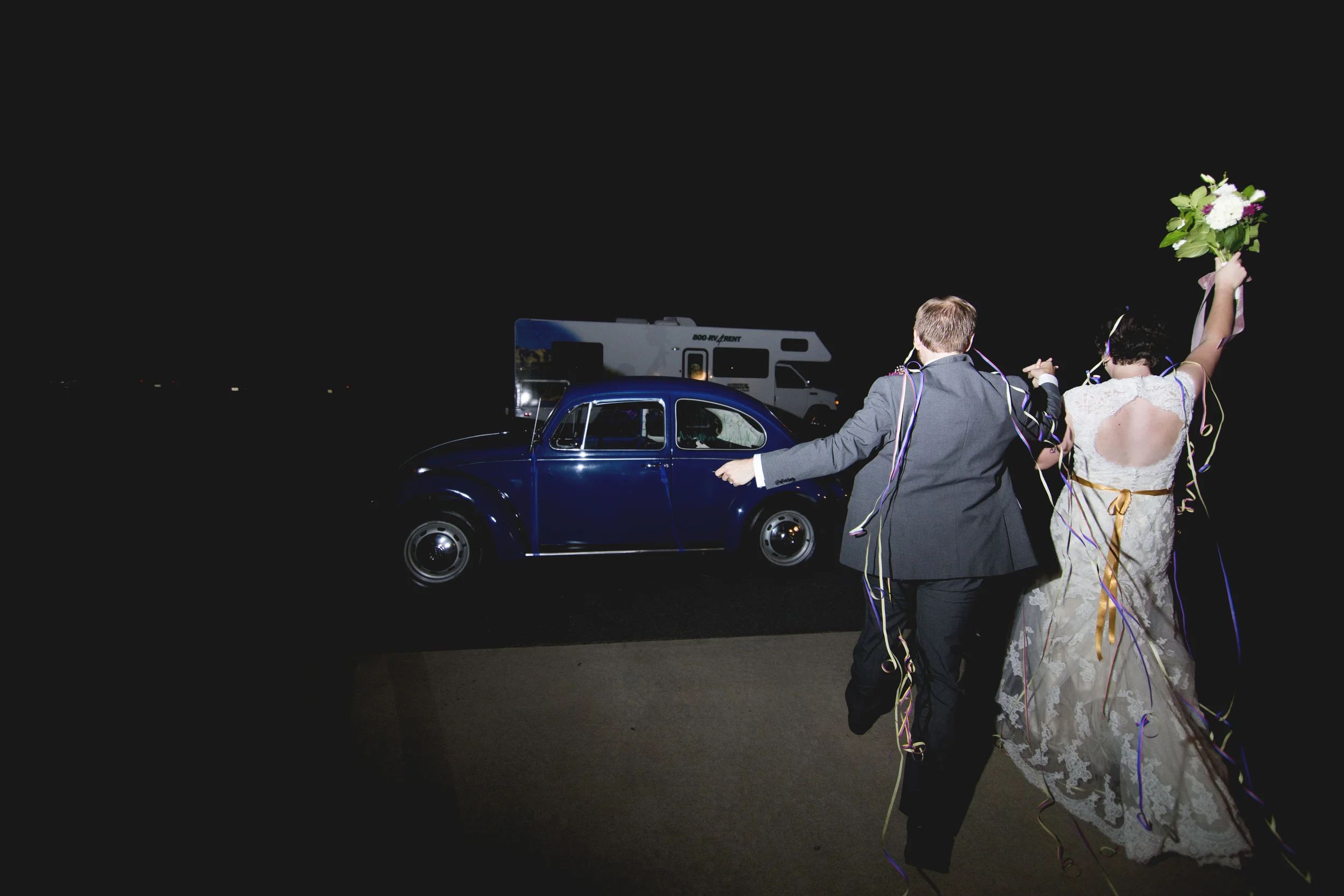I love this. Covered in ribbons and headed to the adorable getaway car! 