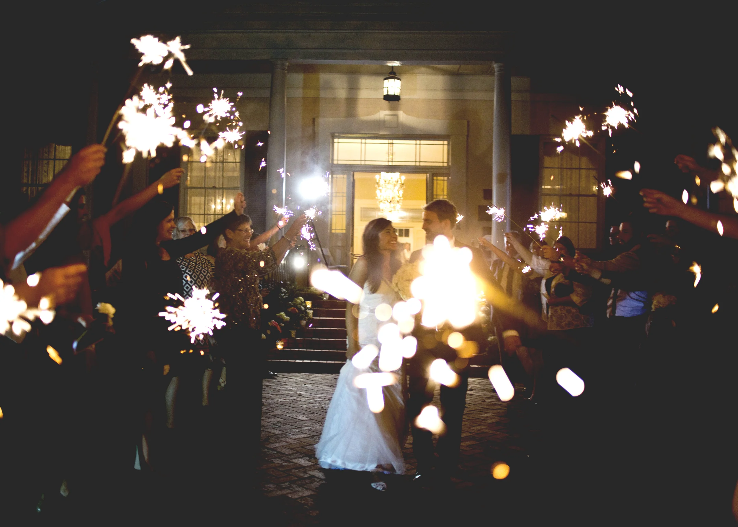 I have to tell you, for this exit, there was a gentleman standing right in the middle of the isle for most of it! The videographer and I kept saying, "excuse me! excuse me! clear the isle please!" Exits are fast, you know! Finally, he stepped to the side, and I kind of love his big sparkler right in front of me. Sometimes what I think is an error, turns out pretty great. 