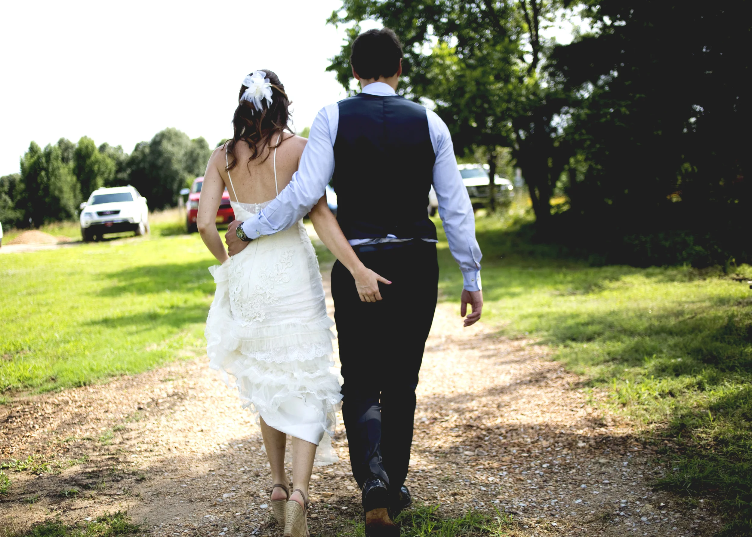 This isn't technically an "exit" shot, but I love it so much. Kathryne and Sergi came to me all the way from Spain. Kathryne is from here, and I was so excited to be a part of their Arkansas wedding. (they had one in Spain, too!) After we finished their couples portraits, I snagged this one as they were walking away. They are adorable. 