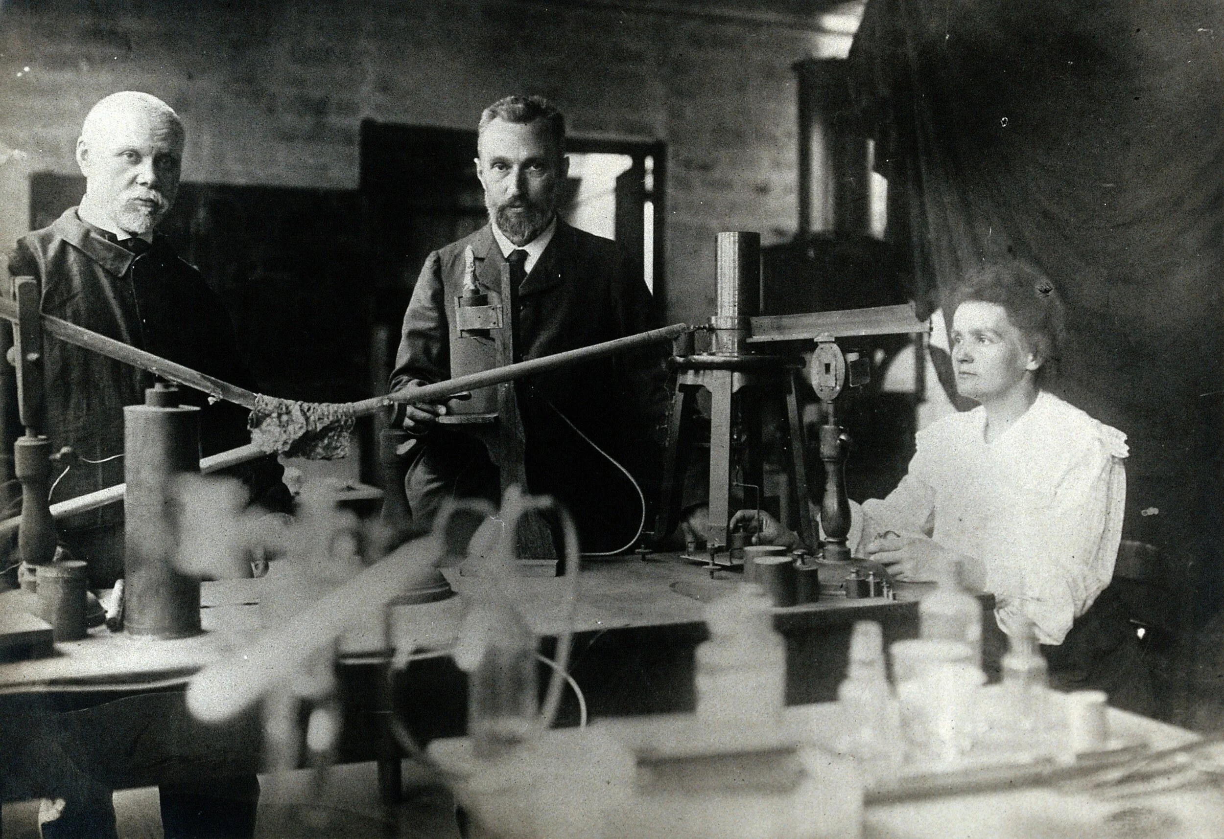 Marie Curie in the lab. Photo via WikiMedia