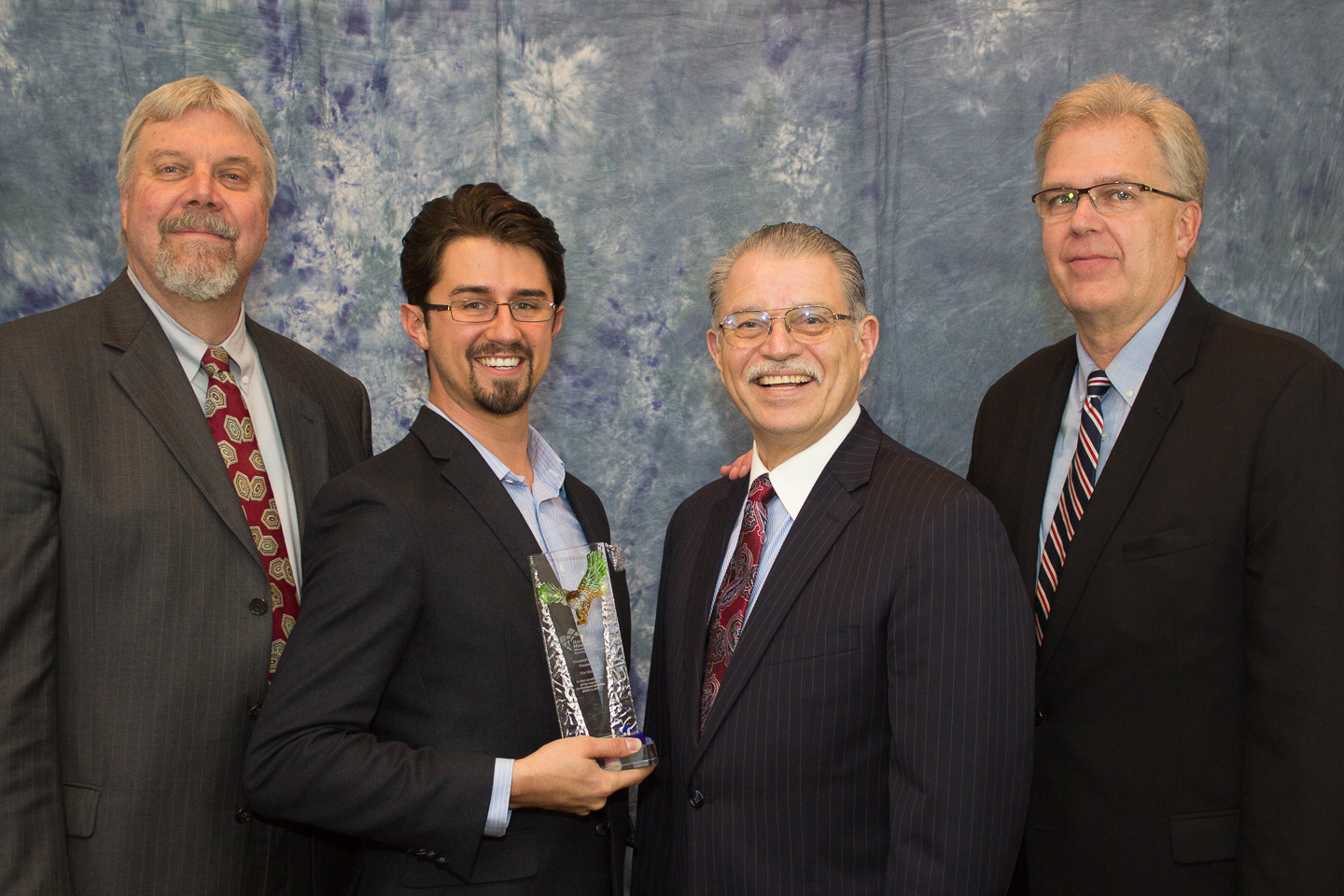 Jeff Quint, Trio Group Executive Vice President; Ricardo Ibarra, Trio Group Creative Director; Fernando Martinez, Northwest Mountain MSDC President and CEO; Dennis Brooks, Trio Group President